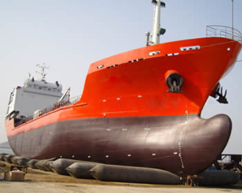 A ship is launching using several ship launching airbags