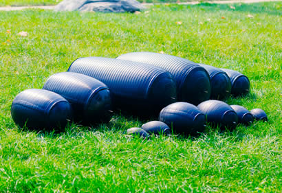 Without bypass inflatable pipe plugs on the grass.